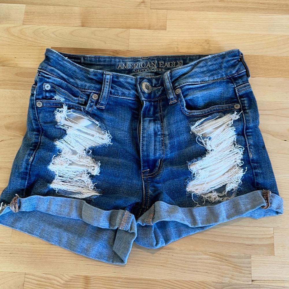 Blue distressed shorts